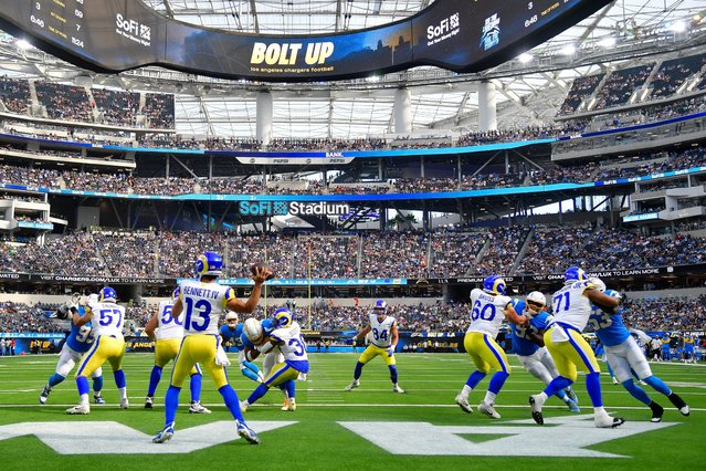 Stetson Bennett, a quarterback for the Los Angeles Rams, drops back to pass during the first half of play against the Los Angeles Chargers in the NFL preseason at SoFi Stadium in Inglewood, California on August 17, 2024. (Photo by Gary A Vasquez/USA TODAY Sports via Reuters)