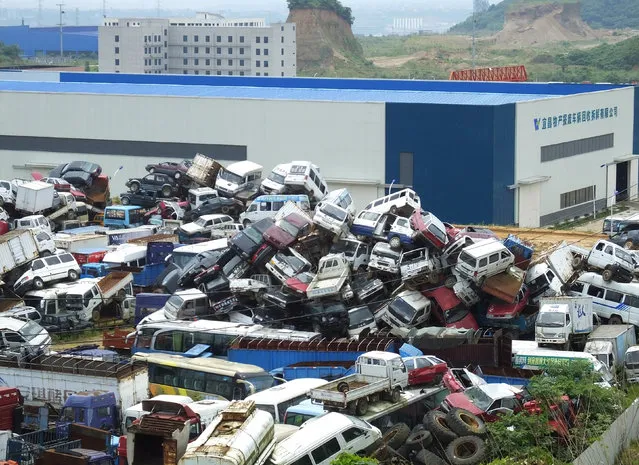 Discarded utomobiles are pictured at a recycling centre in Yichang, Hubei Province, China, May 24, 2016. (Photo by Reuters/China Daily)