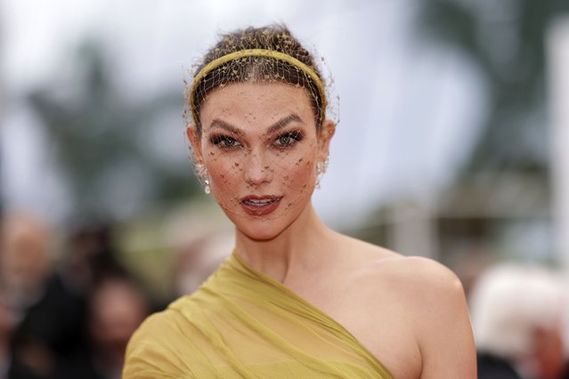 American fashion model Karlie Kloss poses for photographers upon arrival at the premiere of the film “Indiana Jones and the Dial of Destiny” at the 76th international film festival, Cannes, southern France, Thursday, May 18, 2023. (Photo by Vianney Le Caer/Invision/AP Photo)