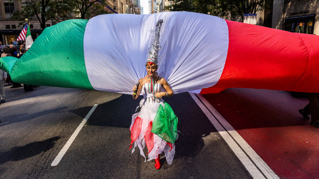 A reveller takes part in the 80th Annual Columbus Day Parade in New York, U.S., October 14, 2024. (Photo by Eduardo Munoz/Reuters)