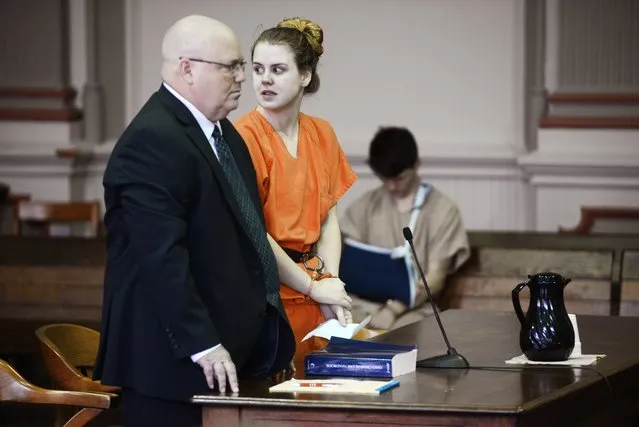 Emile Weaver, center, standing next to her attorney Aaron Miller, left, looks toward the gallery while addressing the court during her sentencing Monday, June 27, 2016, in Muskingum County Common Pleas Court in Zanesville, Ohio. Muskingum County Common Pleas Judge Mark Fleegle sentenced Weaver to life in prison without parole for disposing  of her newborn baby in a trash bin outside the Delta Gamma Theta sorority house on campus. (Photo by Chris Crook/Times Recorder via AP Photo)