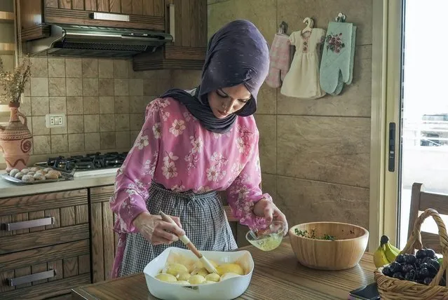 TikTok chef Abir El Saghir prepares a pastry dish at her kitchen in Jeb Jennin, west Bekaa, Lebanon on June 30, 2022. (Photo by Issam Abdallah/Reuters)