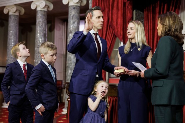 US Sen. Josh Hawley is joined by his wife, Erin, and their children on Friday, January 3, 2025, as Vice President Kamala Harris conducts his ceremonial swearing-in at the Capitol. (Photo by Tom Brenner/The New York Times/Redux)