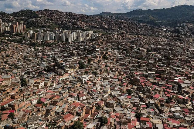 Homes cover a hill in the Petare neighborhood of Caracas, Venezuela, Saturday, September 24, 2022. (Photo by Matias Delacroix/AP Photo)