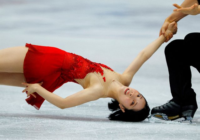 Japan’s Riku Miura and Ryuichi Kihara compete in the World Figure Skating Championships in Boston, Massachusetts on March 27, 2025. (Photo by Brian Snyder/Reuters)