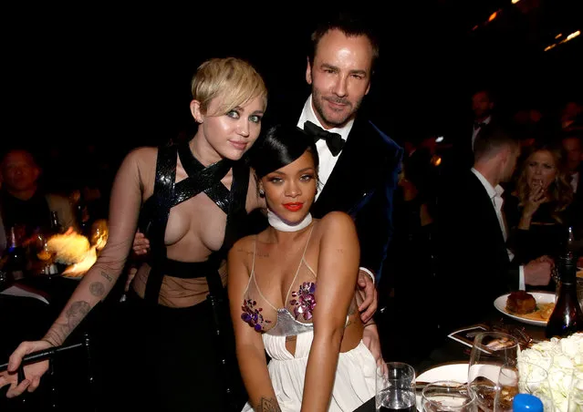 (L-R) Recording artists Miley Cyrus, Rihanna and honoree Tom Ford attend amfAR LA Inspiration Gala honoring Tom Ford at Milk Studios on October 29, 2014 in Hollywood, California. (Photo by Christopher Polk/Getty Images for amfAR)