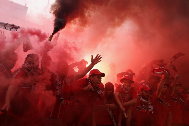 Fans of Wydad celebrate after their team's first goal during the FIFA Club World Cup 2025 Group G football match between Italy's Juventus and Morocco's Wydad AC at the Lincoln Financial Field stadium in Philadelphia on June 22, 2025. (Photo by Charly Triballeau/AFP Photo)