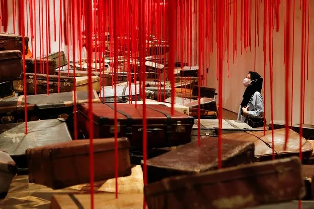 A visitor looks at artwork titled “The Soul Trembles”, an installation by Chiharu Shiota, at Museum MACAN in Jakarta, Indonesia on January 3, 2023. (Photo by Ajeng Dinar Ulfiana/Reuters)