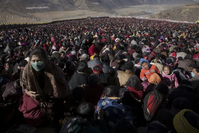 Thousands of ethnic Tibetans gather to listen Buddhist monks' teachings near Larung Wuming Buddhist Institute in remote Sertar county, Garze Tibetan Autonomous Prefecture, Sichuan province, China October 31, 2015. (Photo by Damir Sagolj/Reuters)