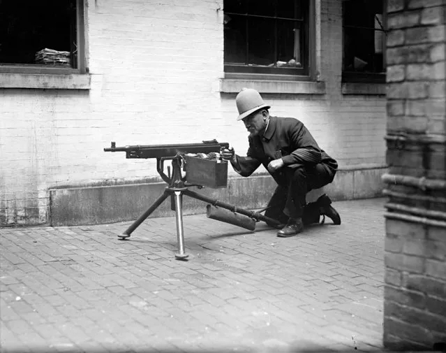 With the latest guns, Boston police will fear nothing. The “Reds” will be met severely in case the start anything. 1919. (Photo by Leslie Jones)