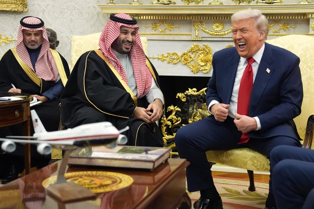 President Donald Trump meets Saudi Arabia's Crown Prince Mohammed bin Salman in the Oval Office of the White House, Tuesday, November 18, 2025, in Washington. (Photo by Evan Vucci/AP Photo)