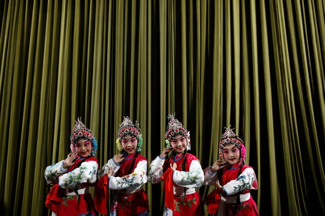 Participants perform during a traditional Chinese opera competition at the National Academy of Chinese Theatre Arts in Beijing, China, November 26, 2016. (Photo by Thomas Peter/Reuters)