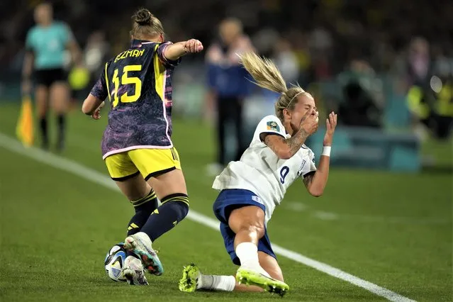 England's Rachel Daly is fouled by Colombia's Ana Guzman during the Women's World Cup quarterfinal soccer match between England and Colombia at Stadium Australia in Sydney, Australia, Saturday, August 12, 2023. (Photo by Rick Rycroft/AP Photo)