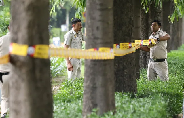 Indian policemen secure the premises around the Canadian embassy in New Delhi, India, 19 September 2023. India asks a Canadian diplomat to leave country after Ottawa expelled an Indian diplomat in a diplomatic row, after Canadian Prime Minster Trudeau accused India of involvement in the murder of Hardeep Singh Nijjar who was shot dead outside of a Sikh temple on 18 June 2023 in Surrey, Canada. According to the press release by the India Ministry of External Affairs, India rejects all allegations by Canada and reject the statement of the Canadian Prime Minister in their Parliament. (Photo by Rajat Gupta/EPA)