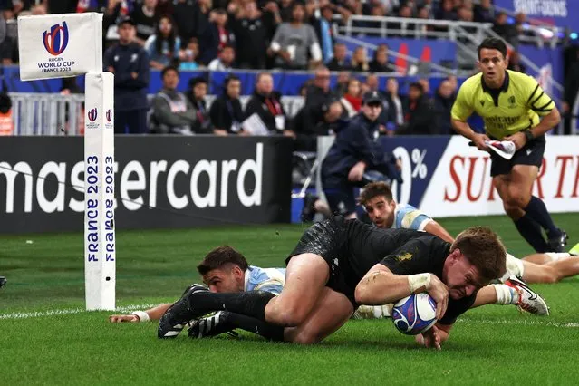 New Zealand's inside centre Jordie Barrett scores a try during the France 2023 Rugby World Cup semi-final match between Argentina and New Zealand at the Stade de France in Saint-Denis, on the outskirts of Paris, on October 20, 2023. (Photo by Anne-Christine Poujoulat/AFP Photo)