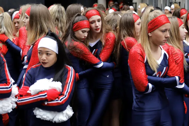 Cheerleaders wait in the cold before New Year's Day Parade in London, Britain January 1, 2017. (Photo by Kevin Coombs/Reuters)