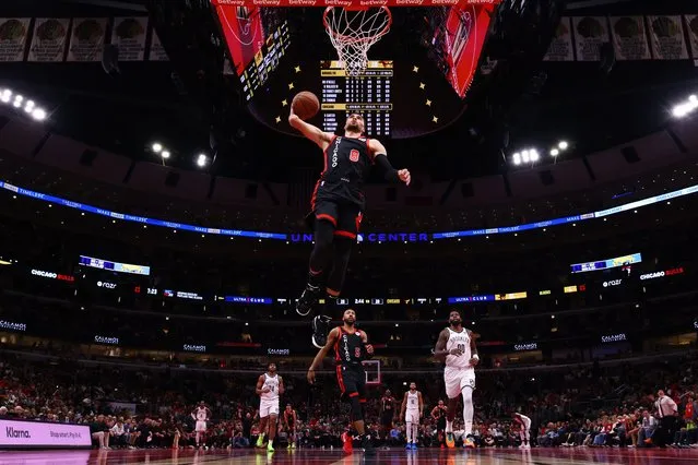 Zach LaVine #8 of the Chicago Bulls dunks against the Brooklyn Nets in the first half of the NBA In-Season Tournament at the United Center on November 03, 2023 in Chicago, Illinois. (Photo by Michael Reaves/Getty Images)