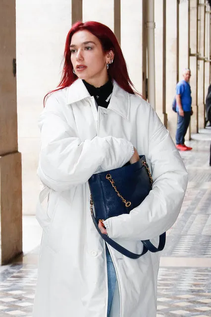 English-Albanian singer Dua Lipa leaving Costes restaurant after lunch in red hair new look in Paris on October 20, 2023. (Photo by Spread Pictures/The Mega Agency)