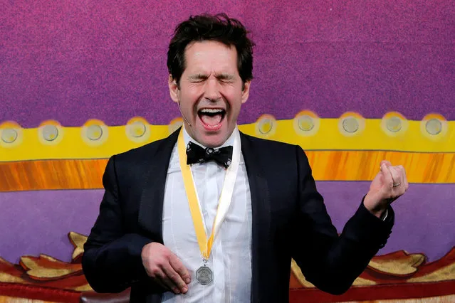 Paul Rudd plays air guitar to a song by the rock band Rush during ceremonies to honor Rudd as Hasty Pudding Theatricals Man of the Year at Harvard University in Cambridge, Massachusetts, February 2, 2018. (Photo by Brian Snyder/Reuters)