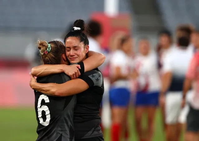 Michaela Blyde (L) and Shiray Kaka of Team New Zealand celebrate after defeating Team France in the Women’s Gold Medal match between Team New Zealand and Team France during the Rugby Sevens on day eight of the Tokyo 2020 Olympic Games at Tokyo Stadium on July 31, 2021 in Chofu, Tokyo, Japan. (Photo by Siphiwe Sibeko/Reuters)