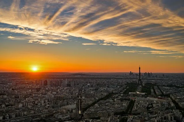 This photograph taken from Montparnasse Tower on September 4, 2023 shows a skyline of Paris during the sunset. (Photo by Miguel Medina/AFP Photo)