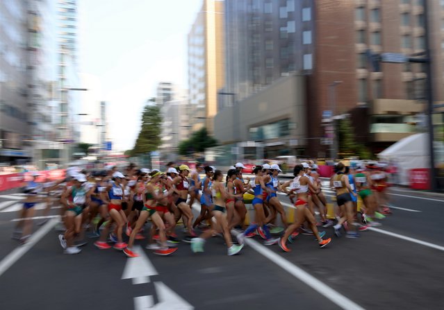 Athletes compete in the Women's 20km Race Walk on day fourteen of the Tokyo 2020 Olympic Games at Sapporo Odori Park on August 6, 2021 in Sapporo, Japan. (Photo by Kim Hong-Ji/Reuters)