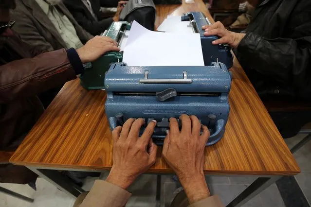 Visually impaired men attend a training session to learn to read in braille at the Government School and Institute for the Blind, a day ahead of the International Day of People with Disabilities, in Peshawar, Pakistan, Pakistan, 02 December 2023. The International Day of Disabled Persons, annually celebrated on 03 December, was proclaimed by the UN General Assembly resolution 47/3 in 1992 and aims to 'promote the rights and well-being of persons with disabilities in all spheres of society and development' as the UN says on its website. The theme for IDPwD 2023 is “United in action to rescue and achieve the Sustainable Development Goals (SDGs) for, with and by persons with disabilities”. (Photo by Bilawal Arbab/EPA)