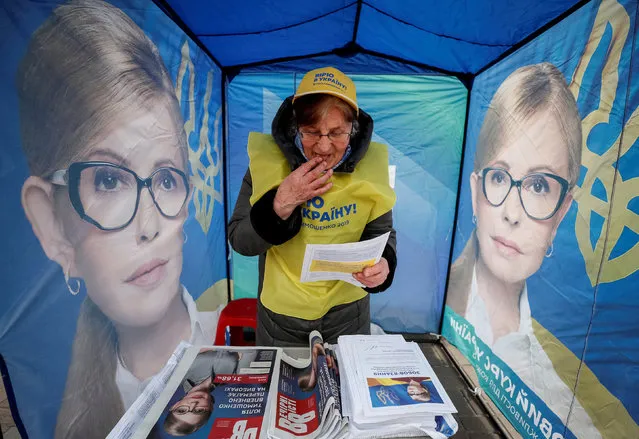 A campaign staff is seen in a pre-election tent of Leader of opposition Batkivshchyna party and presidential candidate Yulia Tymoshenko, in central Kiev, Ukraine March 25, 2019. (Photo by Gleb Garanich/Reuters)