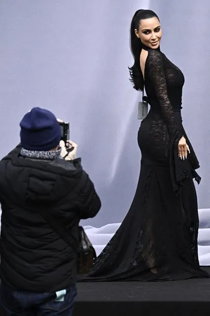 American socialite Kim Kardashian poses as she arrives for the presentation of creations by Balenciaga for the Women Ready-to-wear Fall-Winter 2024/2025 collection as part of the Paris Fashion Week, in Paris on March 3, 2024. (Photo by Julien de Rosa/AFP Photo)