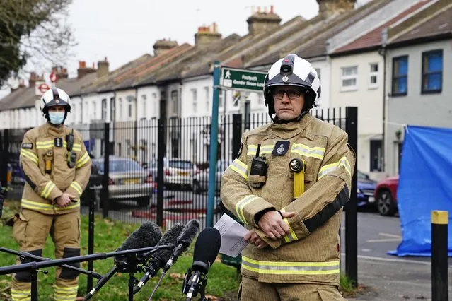 London Fire Brigade Deputy Commissioner Richard Mills speaks to the media at the scene in Sutton, south London, Friday December 17, 2021. Four children have died after fire ripped through the building. About 60 firefighters descended on the home in a residential area and brought the children out of the home as intense fire ripped through the building Thursday night. (Photo by Aaron Chown/PA Wire via AP Photo)
