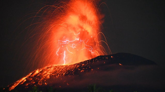 A handout photo made available by Indonesia's Center for Volcanology and Geological Hazard Mitigation shows hot lava spewing from Mount Ibu in North Maluku province, Indonesia, 04 July 2024 (issued 05 July 2024). The Center for Volcanology and Geological Disaster Mitigation (PVMBG) advises the community around Mount Ibu and visitors not to carry out activities within a radius of 2.0 kilometers and a sectoral expansion of 5 kilometers towards the crater opening in the northern part of the active crater of Mount Ibu. (Photo by PVMBG/EPA)