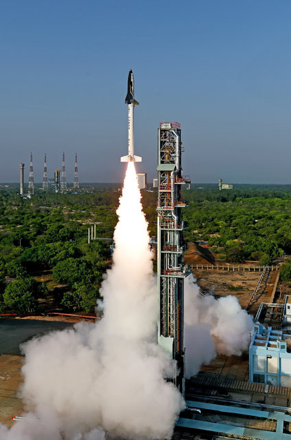 In this photo released on Monday, May 23, 2016, by an official website of the Indian Space Research Organization, India's first indigenously made and reusable space launch vehicle is seen lifted off from the launch pad at Satish Dhawan Space Center in Sriharikota, in the southern Indian state of Andhra Pradesh. India successfully flight tested a model Re-usable launch Vehicle technology Demonstrator or RLV-TD in its bid to develop reusable spacecraft. (Photo by Indian Space Research Organization via AP Photo)