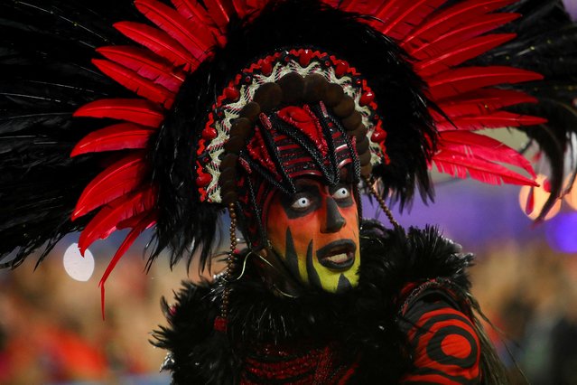 A reveller from Unidos da Tijuca samba school performs during the second night of the Carnival parade at the Sambadrome in Rio de Janeiro, Brazil, April 24, 2022. (Photo by Amanda Perobelli/Reuters)