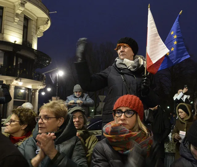 Demonstrators attend a protest by judges and lawyers from across Europe, many of them dressed in their judicial robes, in Warsaw, Poland, Saturday, January 11, 2020. The march was a show of solidarity with Polish judges, who are protesting a bill that would allow the government to fire judges whose rulings they don't like. The legislation has been denounced by the European Union and the United Nations. (Photo by Czarek Sokolowski/AP Photo)