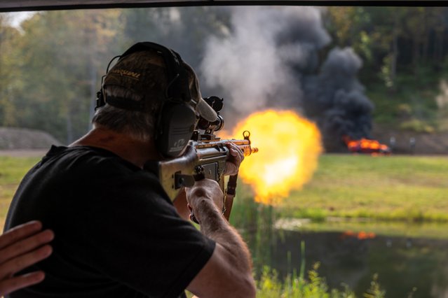 Gun enthusiasts attend the annual Machine Gun Shoot sponsored by Shooters Gauntlet on September 21, 2024 in Monroe, Pennsylvania. The shoot, which has been held since 2016, lets members of the public and others shoot machine guns at targets in a controlled and secure wooded location. The two-day event features raffles, workshops, vendors and opportunities to rent and fire a variety of weapons. According to recent data, in 2021 Americans bought an estimated 19 million guns. (Photo by Spencer Platt/Getty Images)