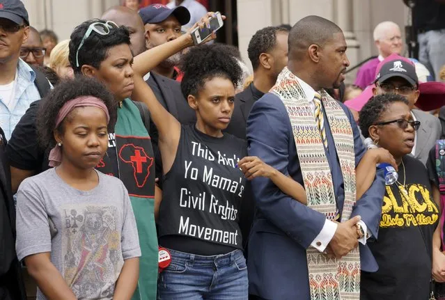 Protesters prepare to march in downtown St. Louis August 10, 2015. (Photo by Rick Wilking/Reuters)