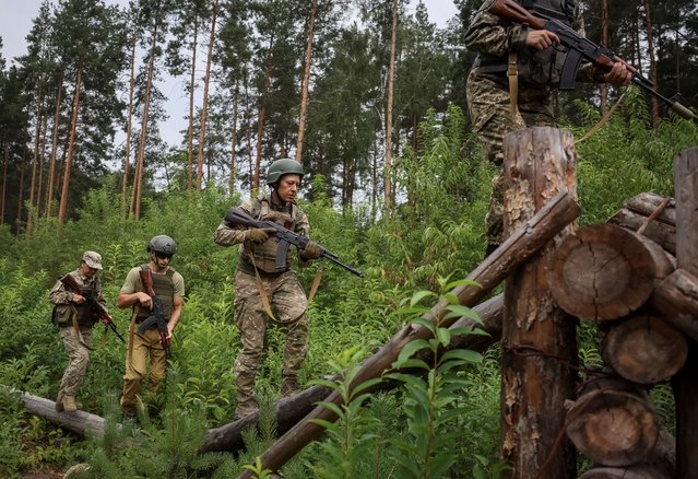 Members of the female anti-drone mobile air defence unit “Bucha Witches” from the military Volunteer formation of Bucha territorial community, attend exercises near the town of Bucha in Kyiv region, Ukraine on August 3, 2024. (Photo by Gleb Garanich/Reuters)