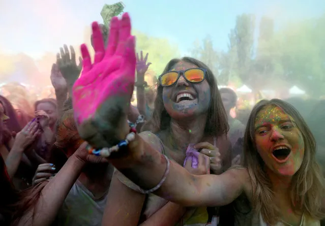 Youth take part in the Festival of Colours in Kiev, Ukraine, June 25, 2016. (Photo by Valentyn Ogirenko/Reuters)