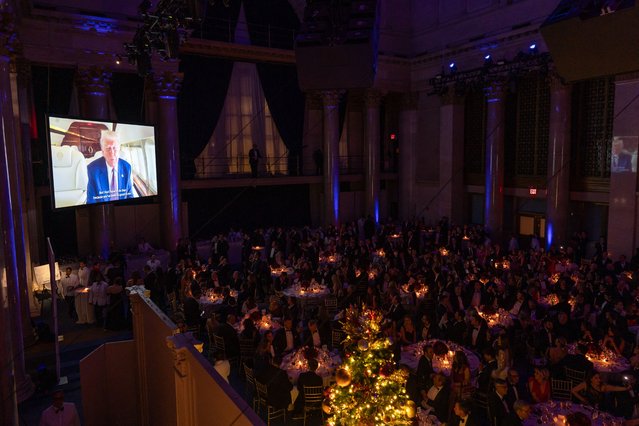 A video message by US President-elect Donald Trump is played at the New York Young Republican Club's Annual Gala at Cipriani's Wall Street in New York City on December 15, 2024. (Photo by Adam Gray/AFP Photo)
