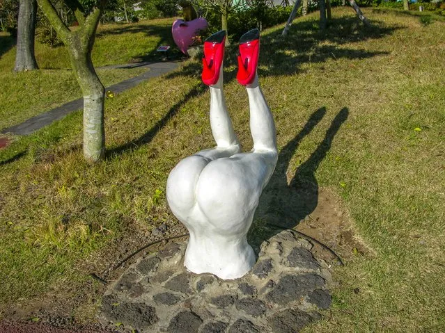 A statue is seen at the theme park “Love Land” on October 19, 2011 in Jeju, South Korea. Love Land is an outdoor sеx-themed sculpture park which opened in 2004 on Jeju Island. The park runs sеx education films and features 140 sculptures representing humans in various sеxual positions. It also has other elements such as large phallus statues, stone labia, and hands-on exhibits such as a “masturbation-cycle”. (Photo by James Jiao/Rex Features/Shutterstock)