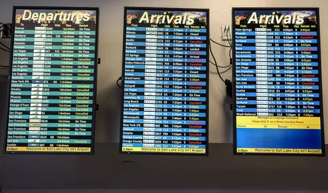 Status boards display numerous cancelled flights as travel has cutback amid concerns of the coronavirus disease (COVID-19), at Salt Lake City International Airport in Salt Lake City, Utah, U.S. April 14, 2020. (Photo by Jim Urquhart/Reuters)