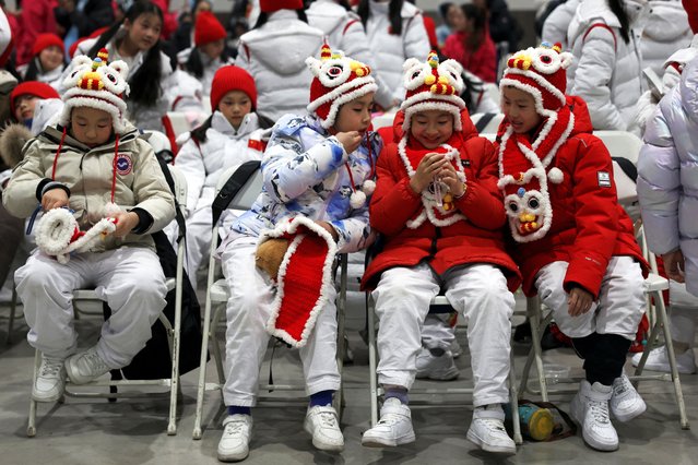 Child performers wait backstage before a countdown celebration event on New Year's Eve, at Shougang Park in Beijing, China, on December 31, 2024. (Photo by Florence Lo/Reuters)