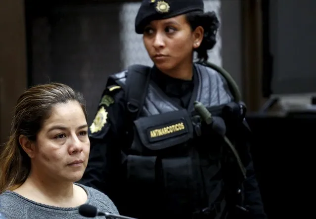 Claudia Mendez (L), former Chief of Customs of the Tax Administration Superintendence (SAT), attends a hearing at the Supreme Court of Justice in Guatemala City September 14, 2015. Mendez is suspected of illicit association, bribery and fraud linked to the customs racket known as La Linea, local media reported. (Photo by Jorge Dan Lopez/Reuters)