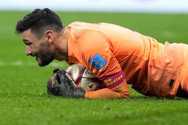 France's goalkeeper Hugo Lloris embraces the ball during the World Cup semifinal soccer match between France and Morocco at the Al Bayt Stadium in Al Khor, Qatar, Wednesday, December 14, 2022. (Photo by Natacha Pisarenko/AP Photo)