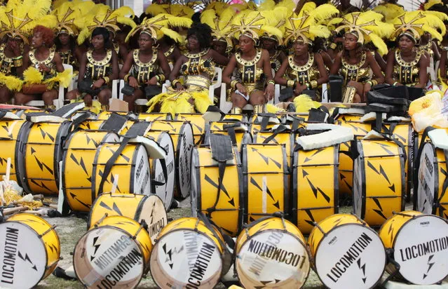 Performers sit near their drums  before the start of  Lagos Carnival in Lagos, Nigeria,  Monday, April 1, 2013. Performers filled the streets of Lagos' islands Monday as part of the Lagos Carnival, a major festival in Nigeria's largest city during Easter weekend. (Photo by Sunday Alamba/AP Photo)