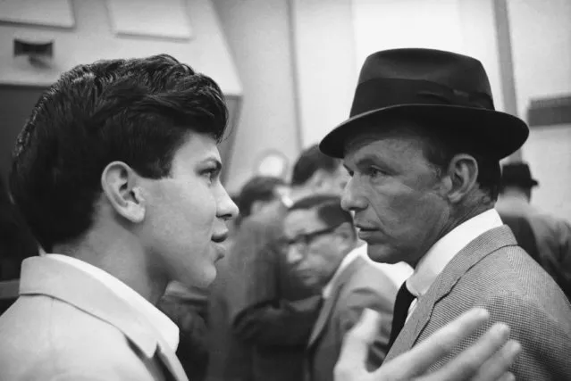 Frank Sinatra Jr., who is embarking on a singing career of his own, talks with his father on December 7, 1962. Frank Sr., is all for his boy's show business career, “if that's what he wants”. The young Sinatra started out by asking the Elliott brothers for a chance to sing with their band during a Disneyland appearance. Later he appeared on the Jack Benny television program and has now been asked to appear on the Perry Como show. “He's more of an actor than a singer”, his father says. “His tonal quality's pretty good. But he needs more training”. (Photo by AP Photo)