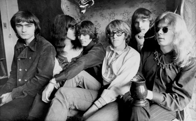 The rock band Jefferson Airplane pose in their Pacific Heights, San Francisco apartment, December 5, 1968. From left: Marty Balin, Grace Slick, Spencer Dryden, Paul Kantner, Jorma Kaukonen and Jack Casady. (Photo by AP Photo)