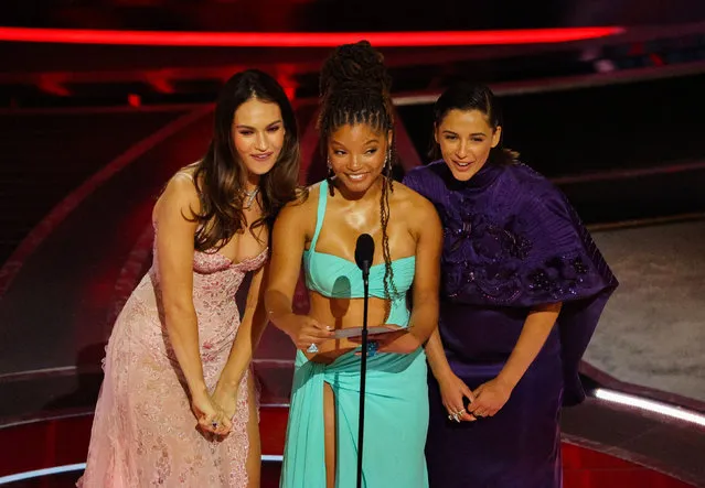 Actresses Halle Bailey, Lily James, and Naomi Scott present the Oscar for the Best Animated Feature Film at the 94th Academy Awards in Hollywood, Los Angeles, California, U.S., March 27, 2022. (Photo by Brian Snyder/Reuters)