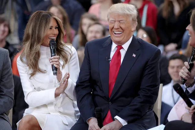 U.S. Republican presidential candidate Donald Trump reacts to an answer his wife Melania gives during an interview on NBC's “Today” show in New York, April 21, 2016. (Photo by Brendan McDermid/Reuters)