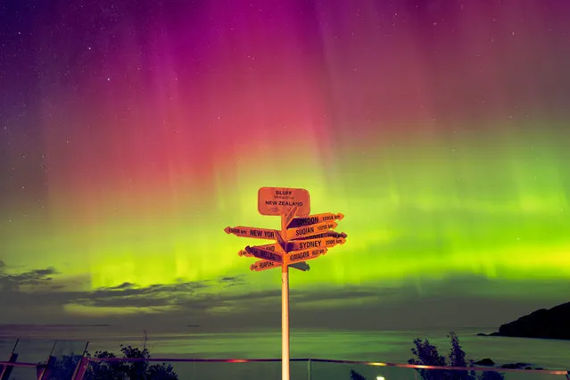 Aurora australis, also known as the Southern Lights photographed in the New Zealand town of Bluff on April 24, 2023. (Photo by Rita Baker/The Guardian)